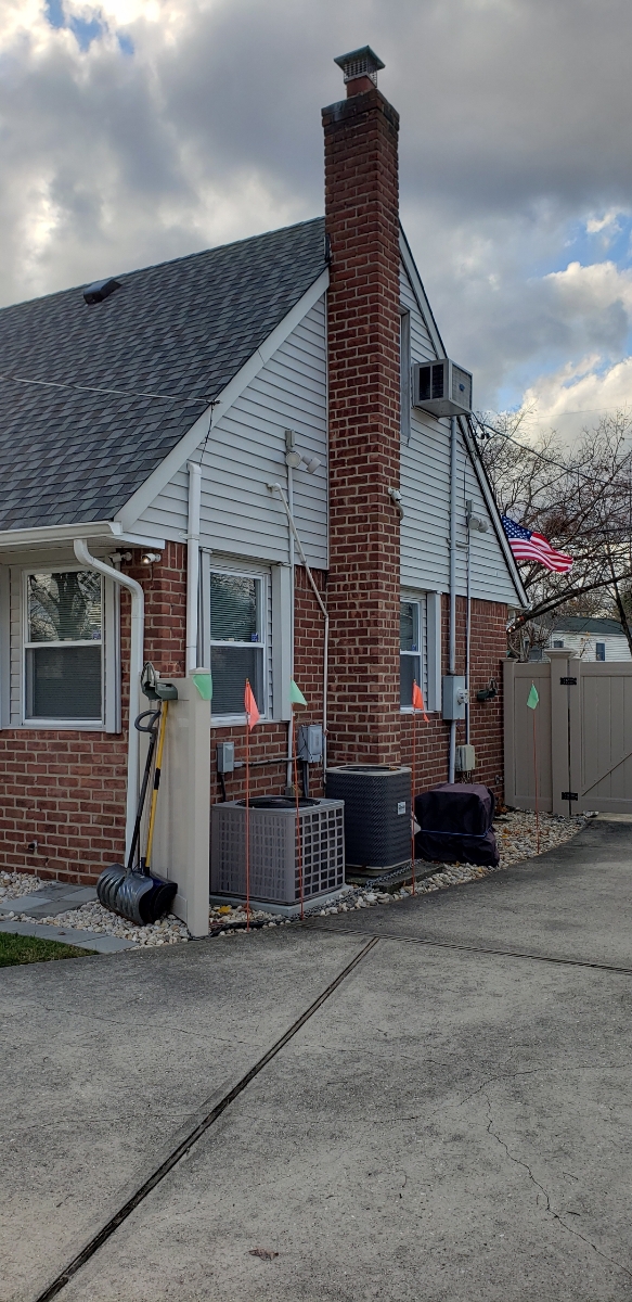 Professional chimney repointing restoring brick joints in West Hempstead, NY