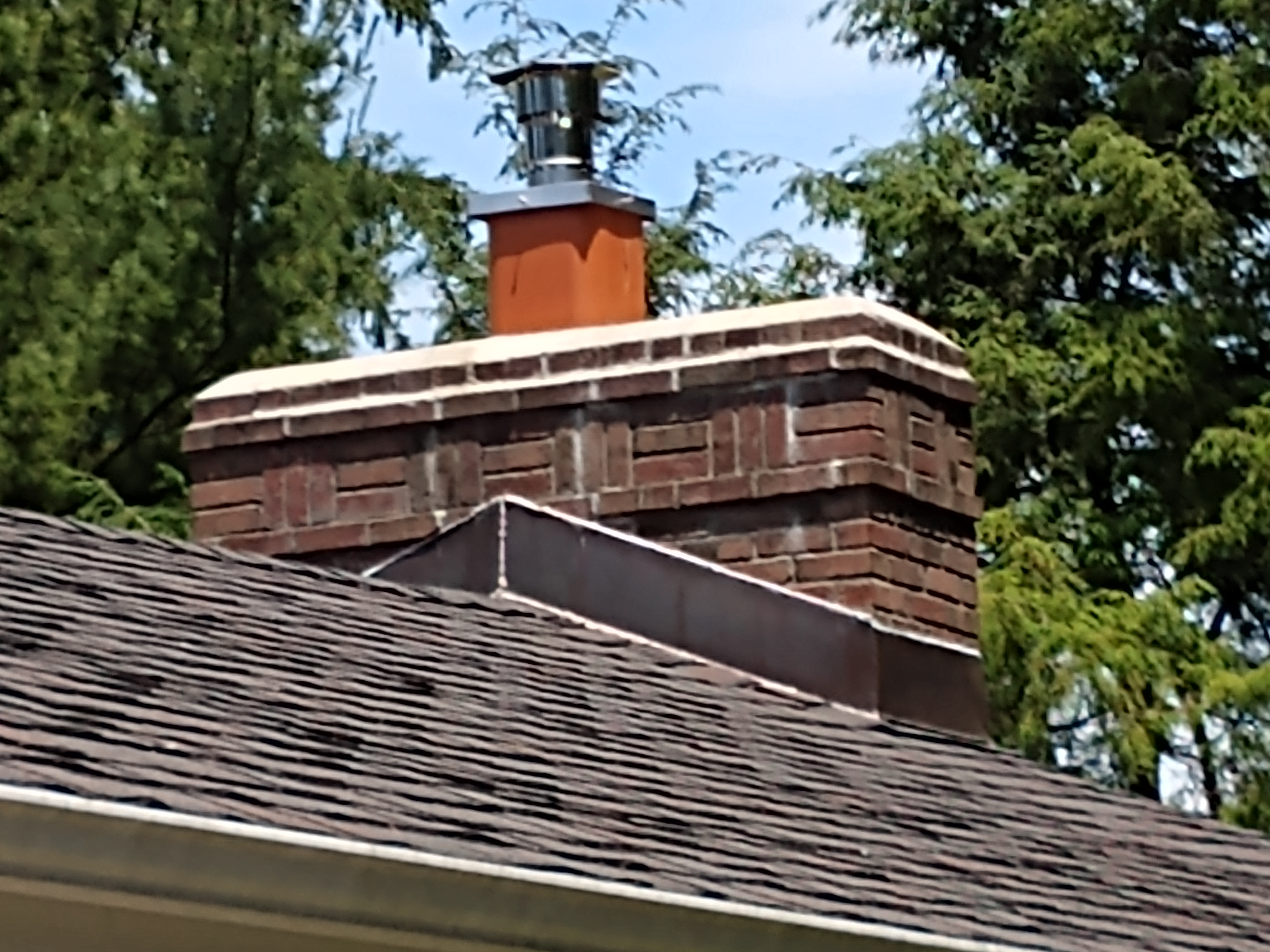 Stainless steel chimney cap with animal guard in West Hempstead, New York